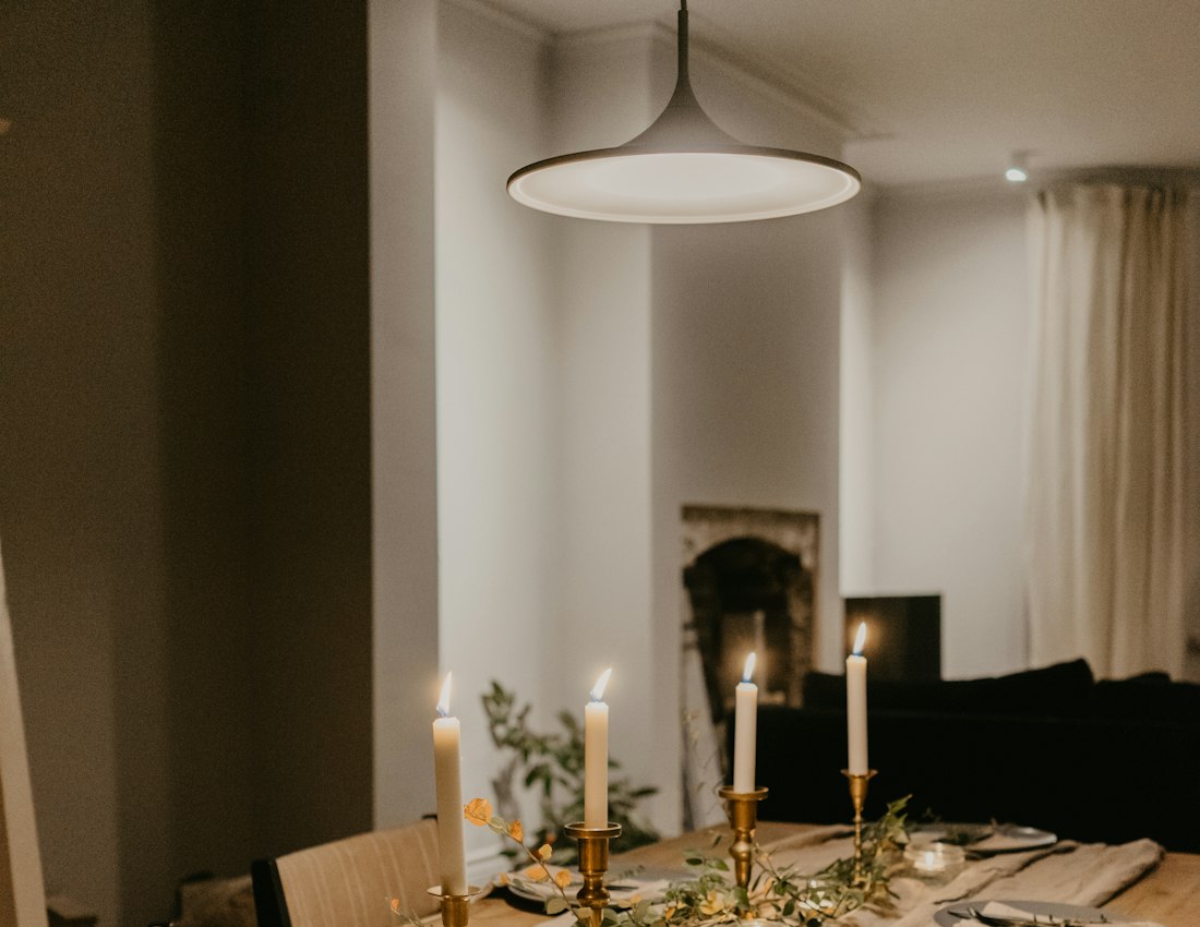 Table set with candlelight at dusk